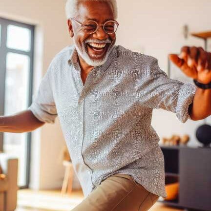 Smiling-older-black-man-in-living-room2